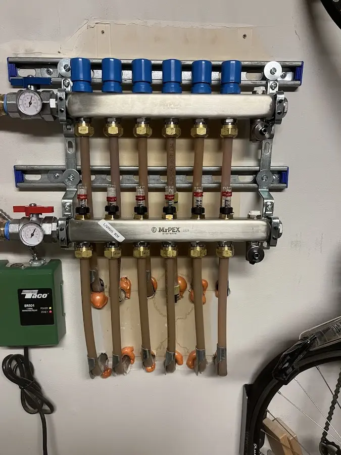 Plumber performing Leak Detection at a residential property in New York Mills